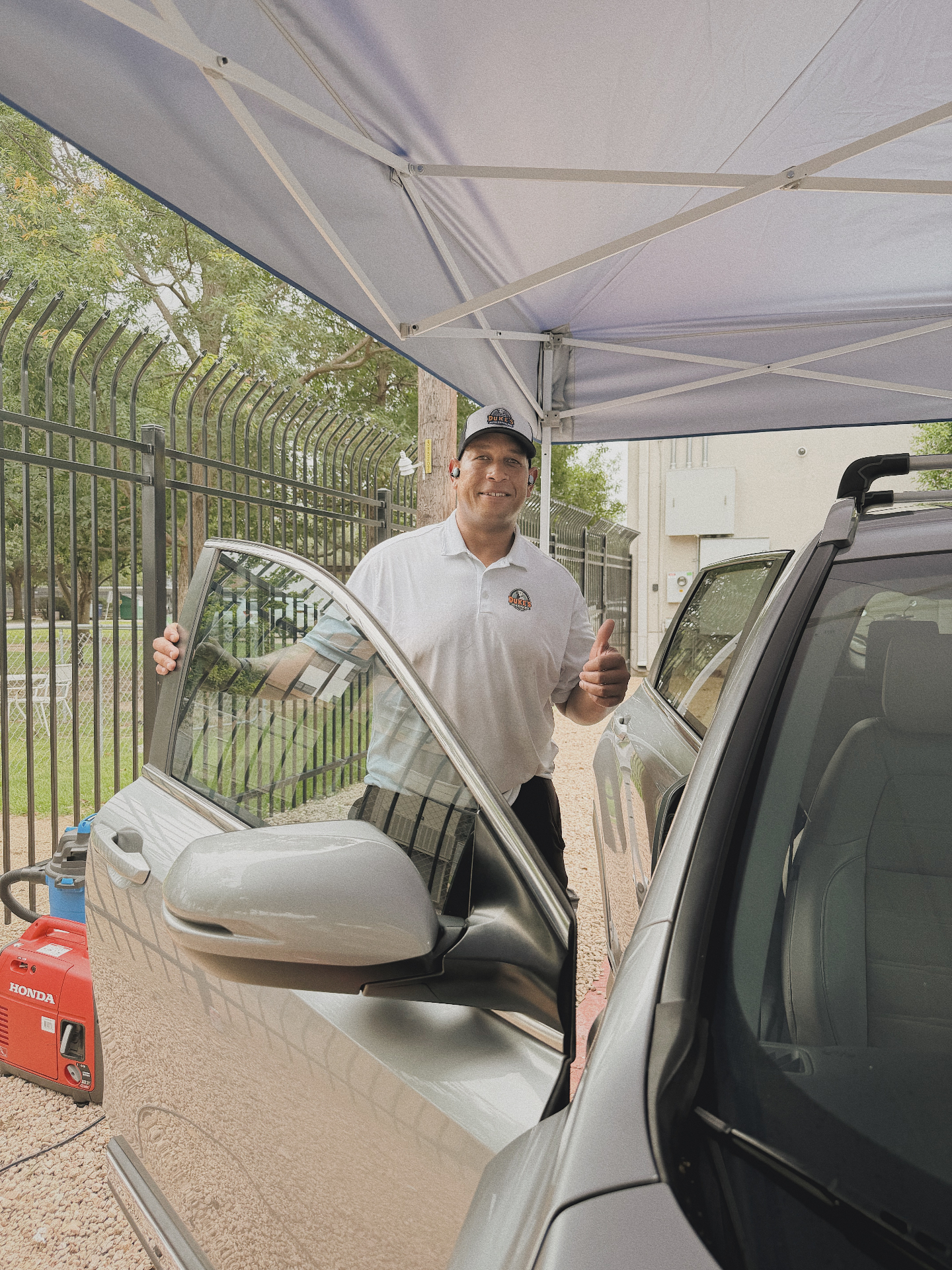 Mobile auto detailing in Mueller, Austin — car hand-detailed on the driveway