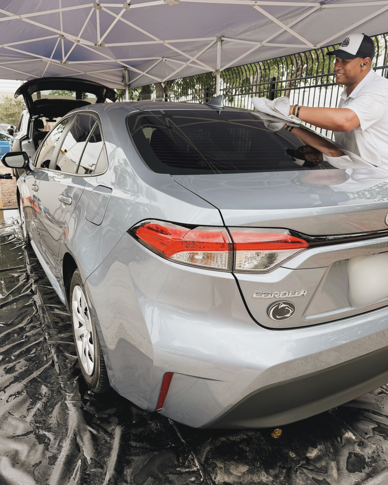 Mobile auto detailing in Hyde Park, Austin — car hand-detailed on the driveway